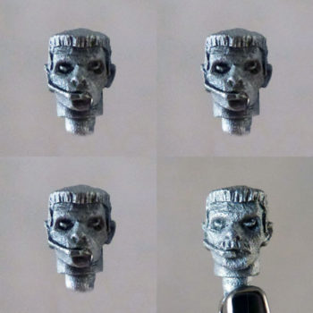 4 Strike Team heads - one with a mustache